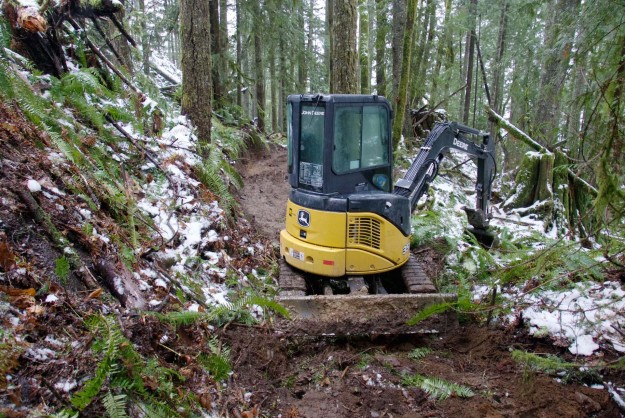 Excavator that's handling the initial trail rough-in